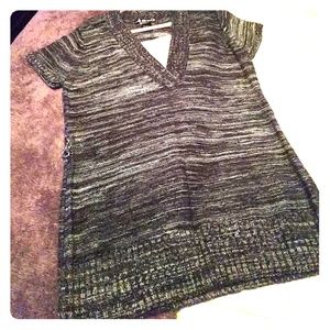 Gray knit tunic length beltable sweater.